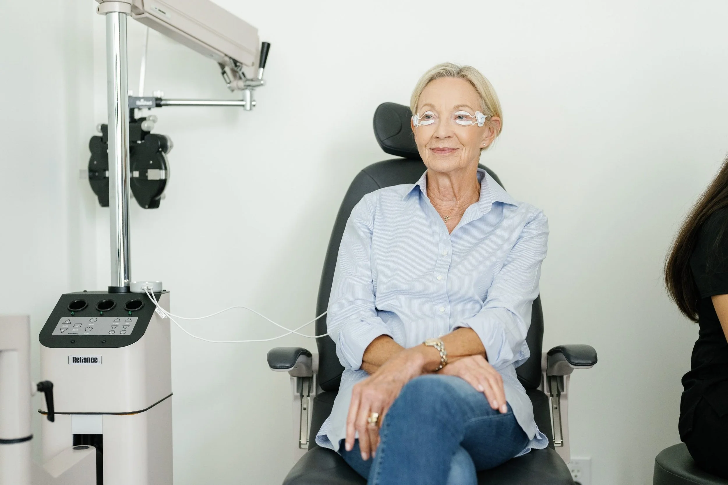 Ophthalmology Associates, S.C. - Patient seated for dry eye examination using TearCare® system at eye clinic